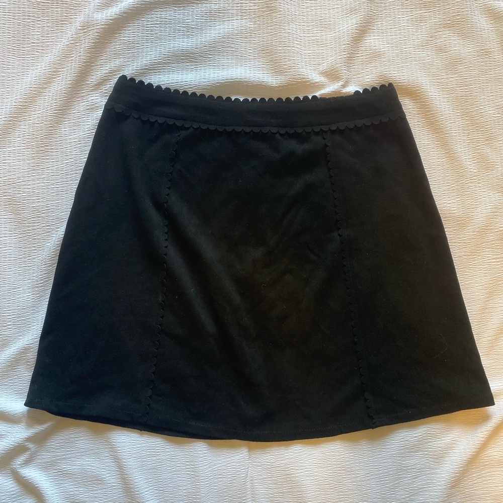 Francesca’s black mini skirt!